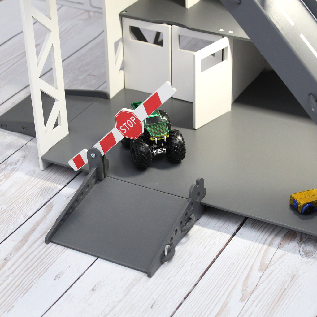 Toy car garage with interactive toy car wash, motion detection activated and inscription with chid's name in white