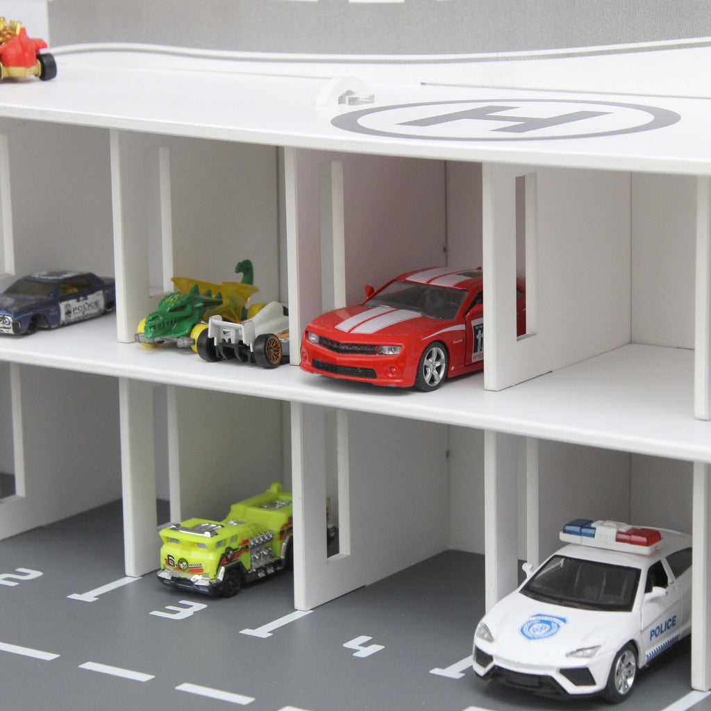 Toy car garage with interactive toy car wash, motion detection activated and inscription with chid's name in white