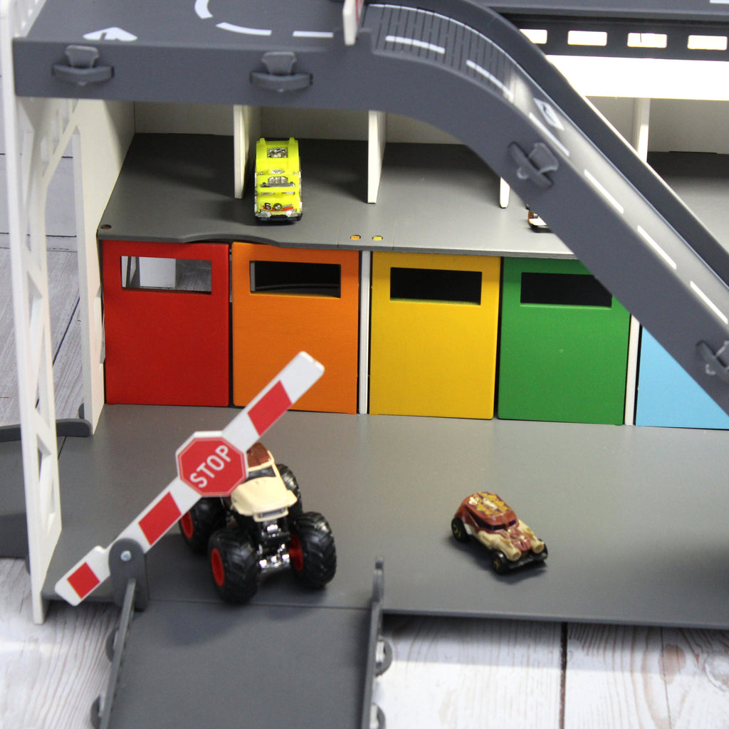 Toy car garage with interactive toy car wash, motion detection activated and inscription with chid's name in white