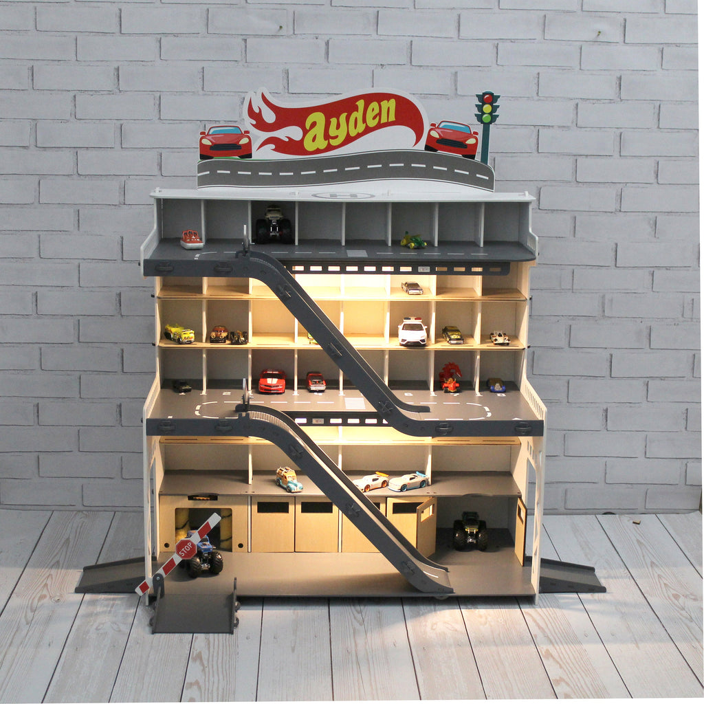 Toy car garage with a toy car wash, doors, gates and mutiple ramps
