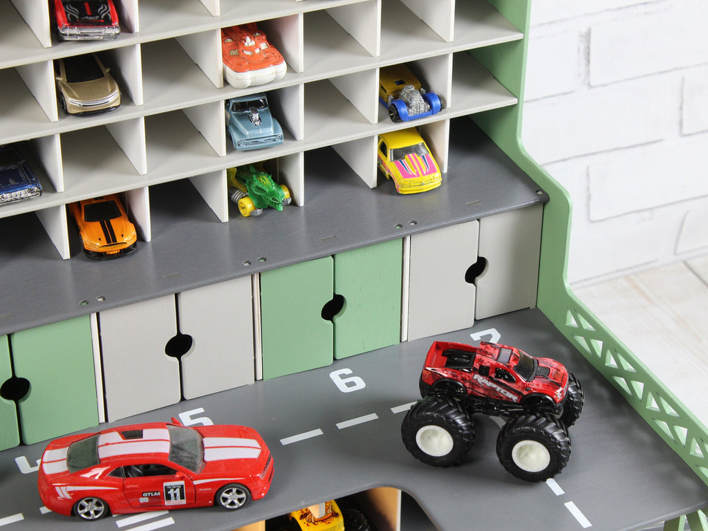 Close-up of the personalized nameplate on the front of the toy garage