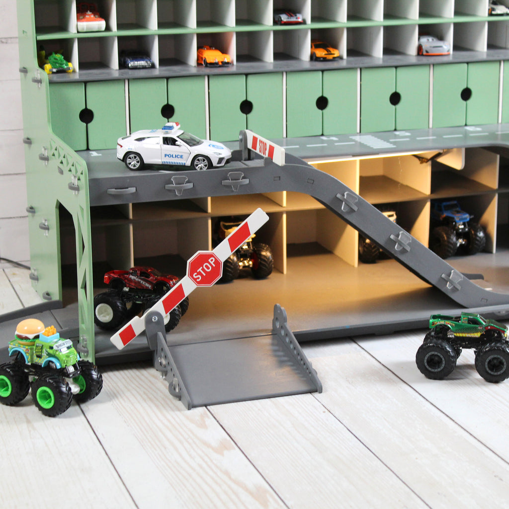 toy car storage with doors and gates