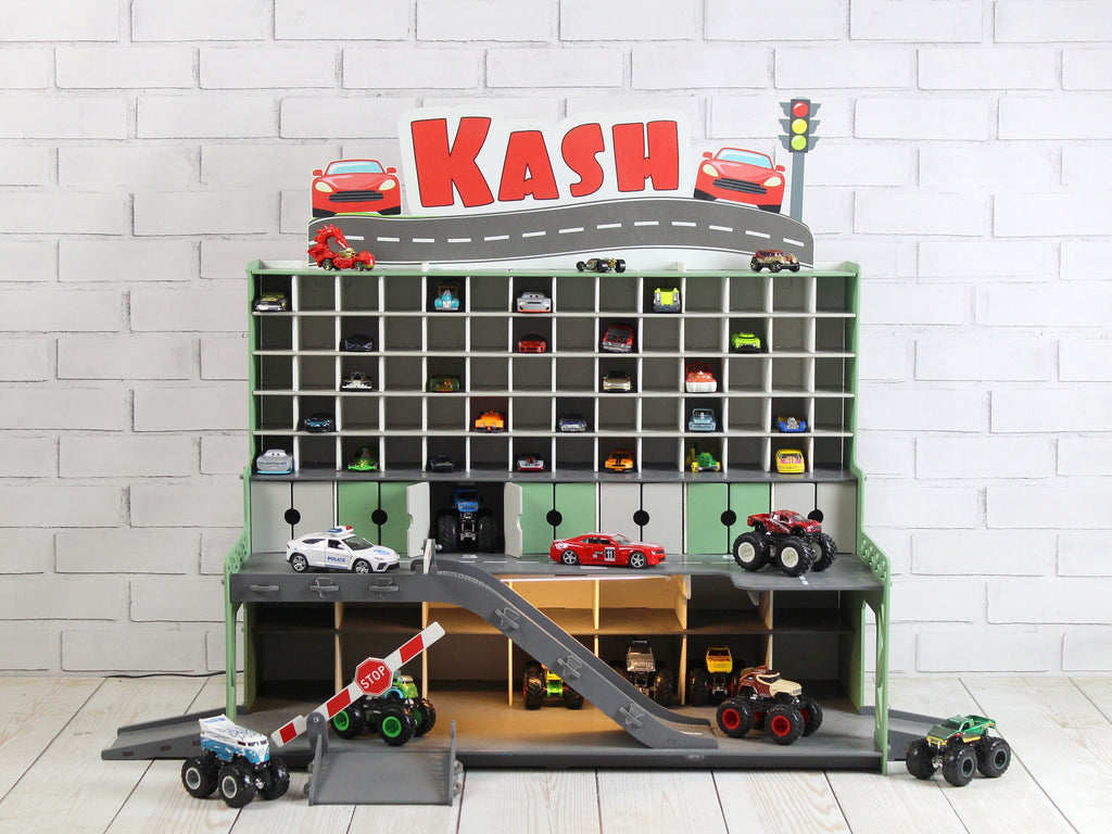 Close-up of the 1:64 scale toy cars parked in the garage