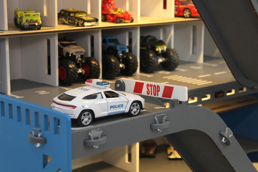 Garage features multiple levels and ramps for toy car play