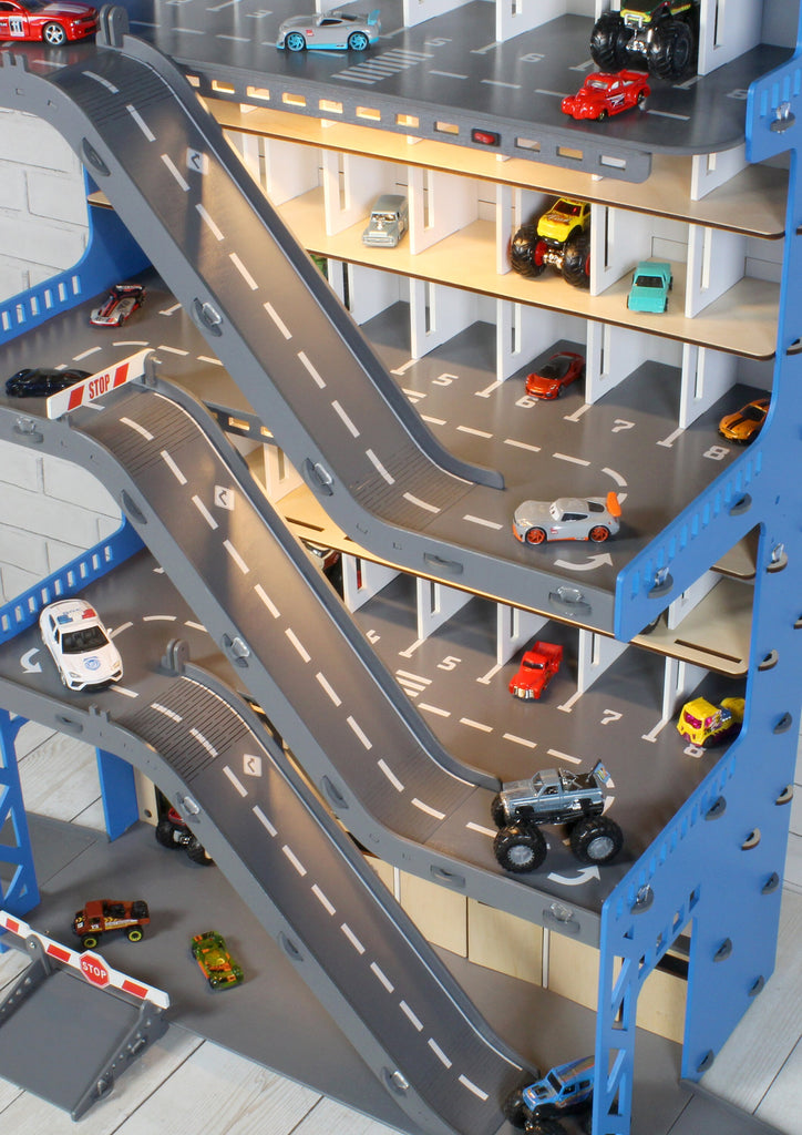 Organize your child&#39;s toy car collection with this sturdy wooden garage