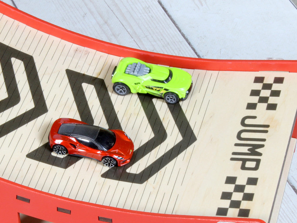 A close-up of the toy car ramp&#39;s storage cells, ideal for organizing toy cars