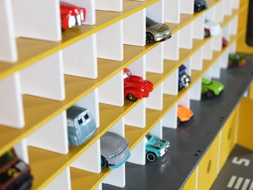Sturdy wooden toy garage with multiple levels and parking spaces for toy cars