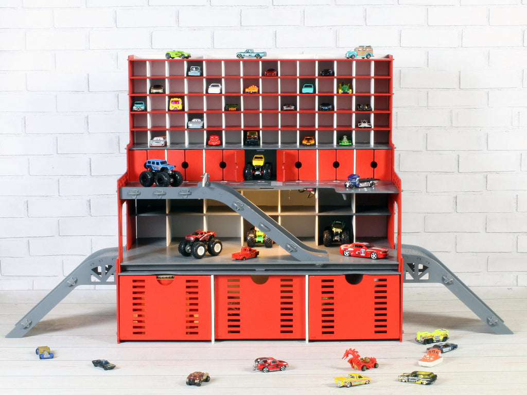 Child playing with toy cars on the Personalized Wooden Toy Car Storage Garage.