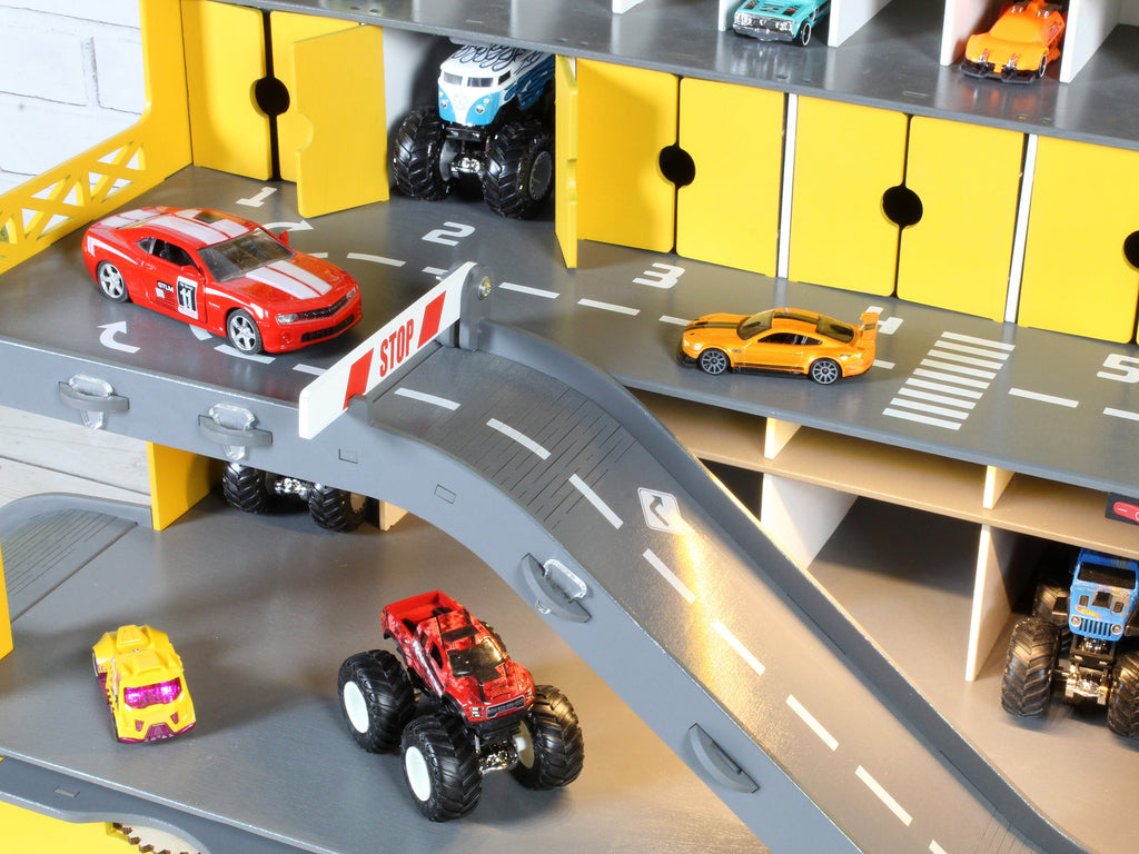 Colorful boys&#39; playset with a toy car garage and storage for tiny cars and trucks
